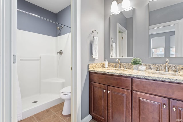 54637 Burdette St Unit 2, South Bend, IN 46637 - bathroom featuring a sink, tile patterned flooring, toilet, and a shower