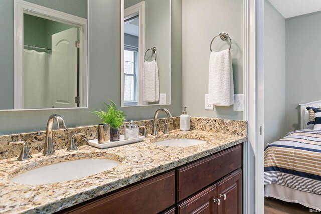 54637 Burdette St Unit 2, South Bend, IN 46637 - full bath featuring a sink, ensuite bathroom, and double vanity