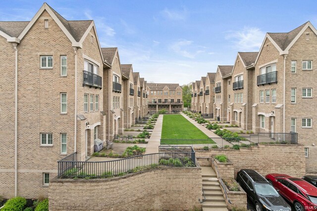 54637 Burdette St Unit 2, South Bend, IN 46637 - view of community with fence and a residential view