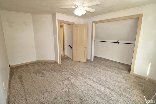 2813 W Franklin St, Evansville, IN 47712 - unfurnished bedroom with a ceiling fan, crown molding, baseboards, a closet, and carpet flooring