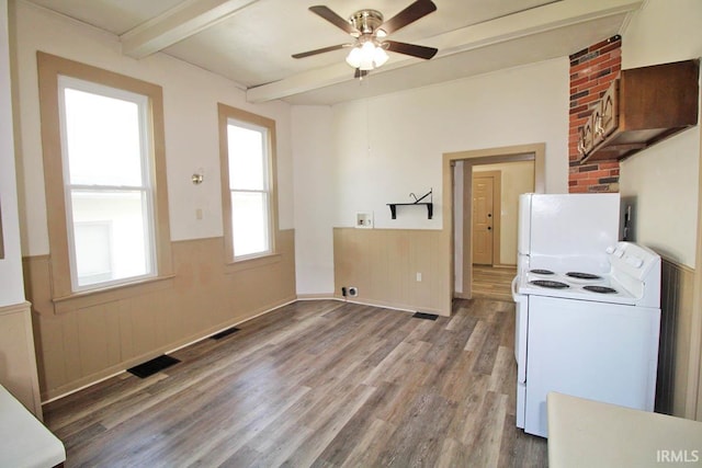 2813 W Franklin St, Evansville, IN 47712 - interior space with wainscoting, wood finished floors, beam ceiling, white appliances, and a ceiling fan