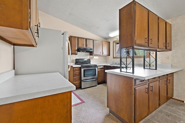 2877 County Road 36, Auburn, IN 46706 - kitchen featuring under cabinet range hood, a peninsula, a textured ceiling, and stainless steel range with electric cooktop