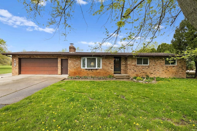2877 County Road 36, Auburn, IN 46706 - single story home with an attached garage, a chimney, driveway, and brick siding