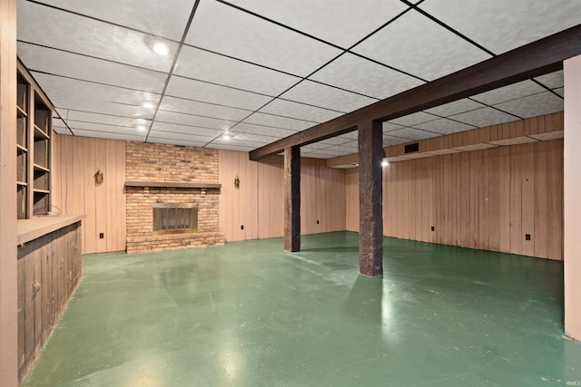 2877 County Road 36, Auburn, IN 46706 - finished basement featuring wooden walls and a brick fireplace