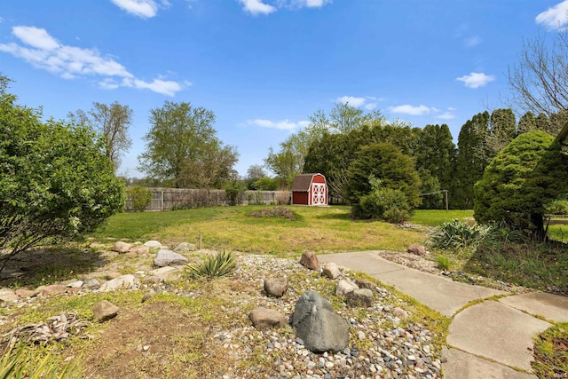 2877 County Road 36, Auburn, IN 46706 - view of yard featuring fence, an outdoor structure, and a storage unit