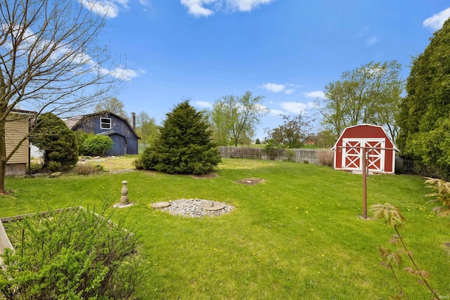 2877 County Road 36, Auburn, IN 46706 - view of yard featuring a barn, an outdoor structure, and fence