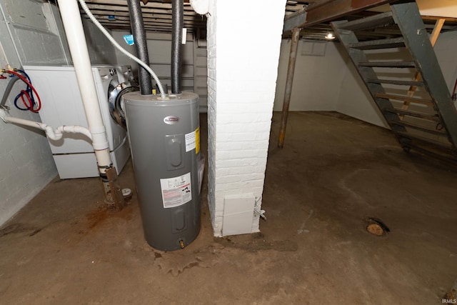 unfinished basement featuring stairs and water heater