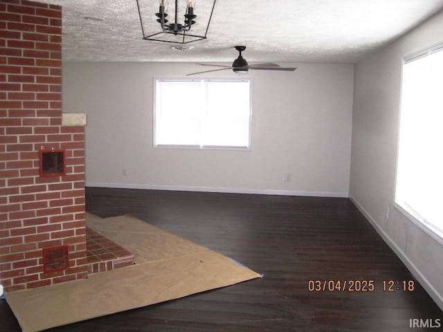 unfurnished dining area featuring a healthy amount of sunlight, baseboards, and a ceiling fan