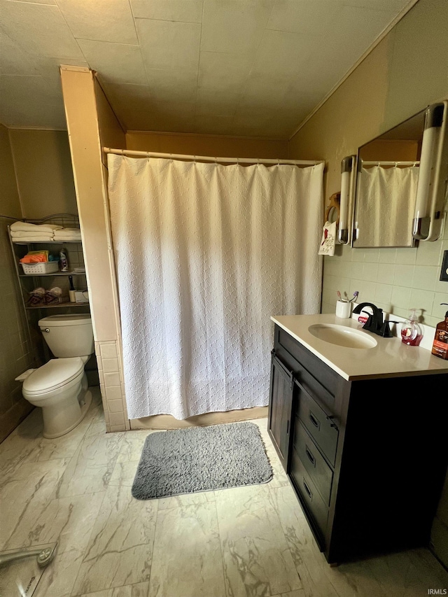 bathroom with vanity, a shower with curtain, and toilet