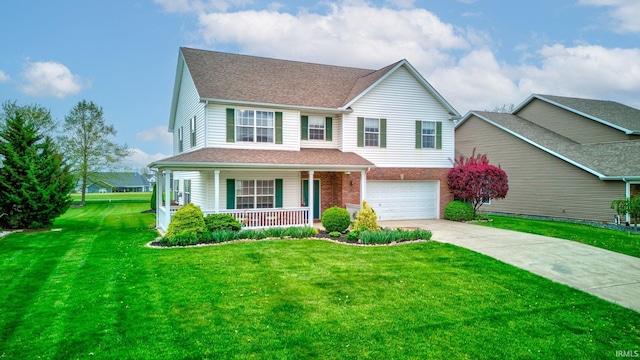traditional home with an attached garage, a front lawn, brick siding, concrete driveway, and covered porch