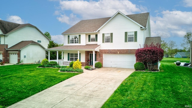 traditional-style home with a porch, driveway, a front yard, a garage, and brick siding