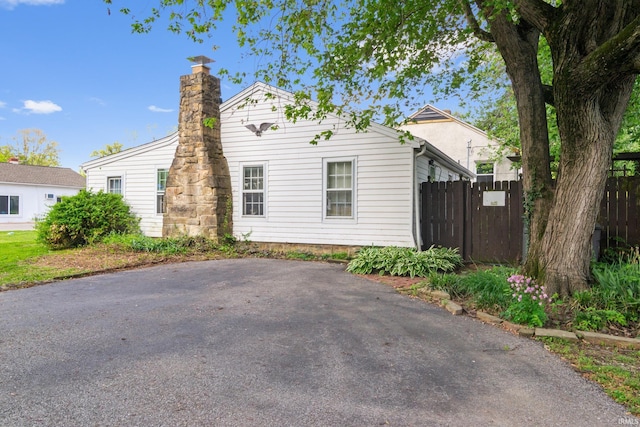 1901 Keck Ave, Evansville, IN 47711 - exterior space with fence and a chimney