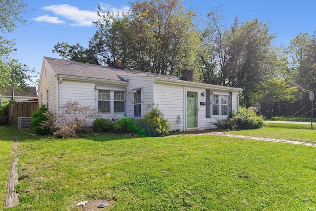 1901 Keck Ave, Evansville, IN 47711 - view of front of home with fence, a chimney, and a front yard