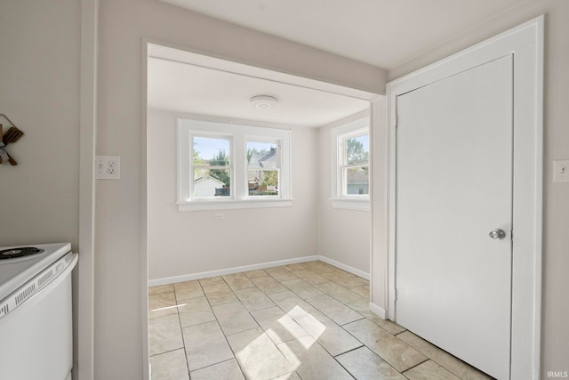 interior space featuring baseboards