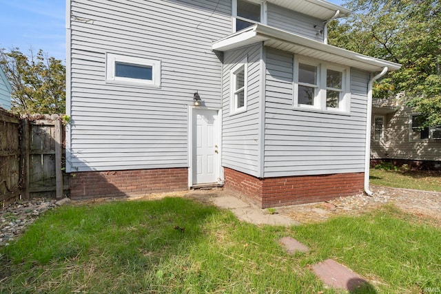 back of property with fence