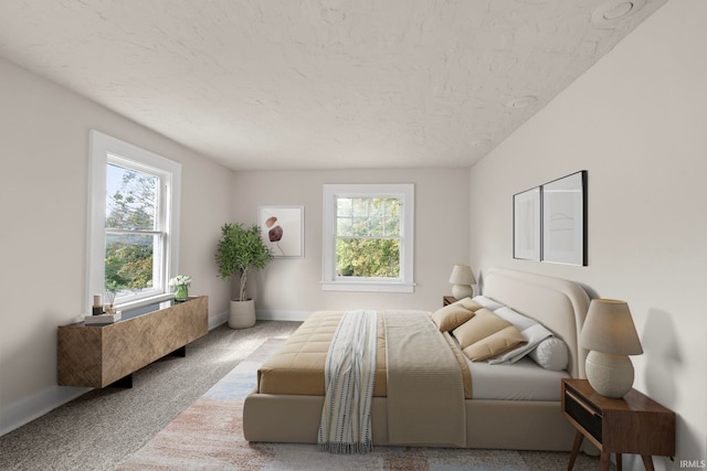 bedroom featuring baseboards, multiple windows, carpet, and a textured ceiling