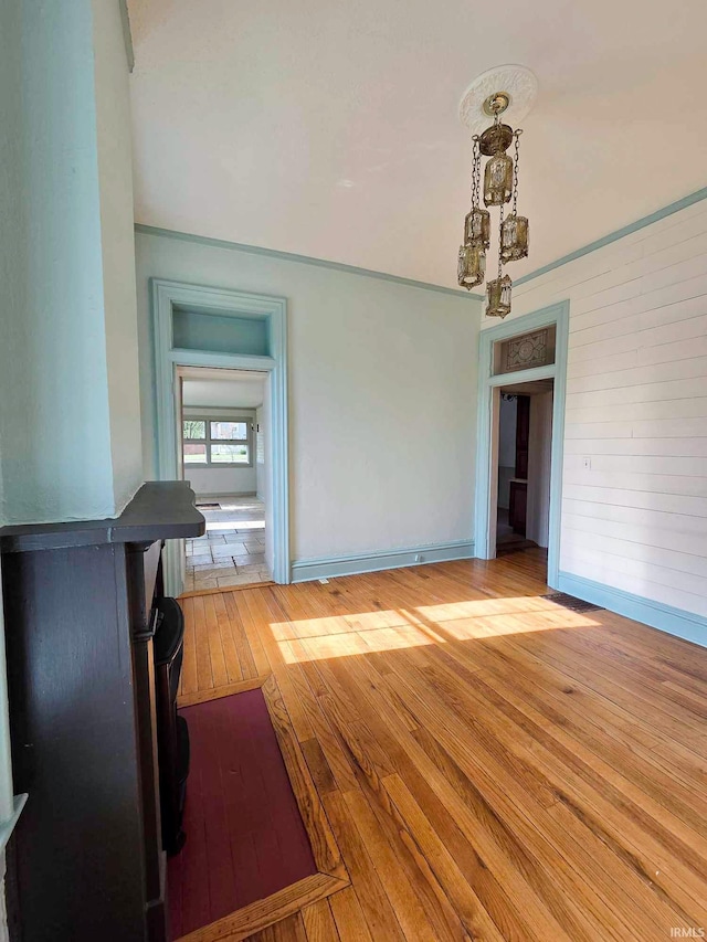 1106 E 5th St, Fowler, IN 47944 - interior space featuring baseboards, an inviting chandelier, and hardwood / wood-style flooring