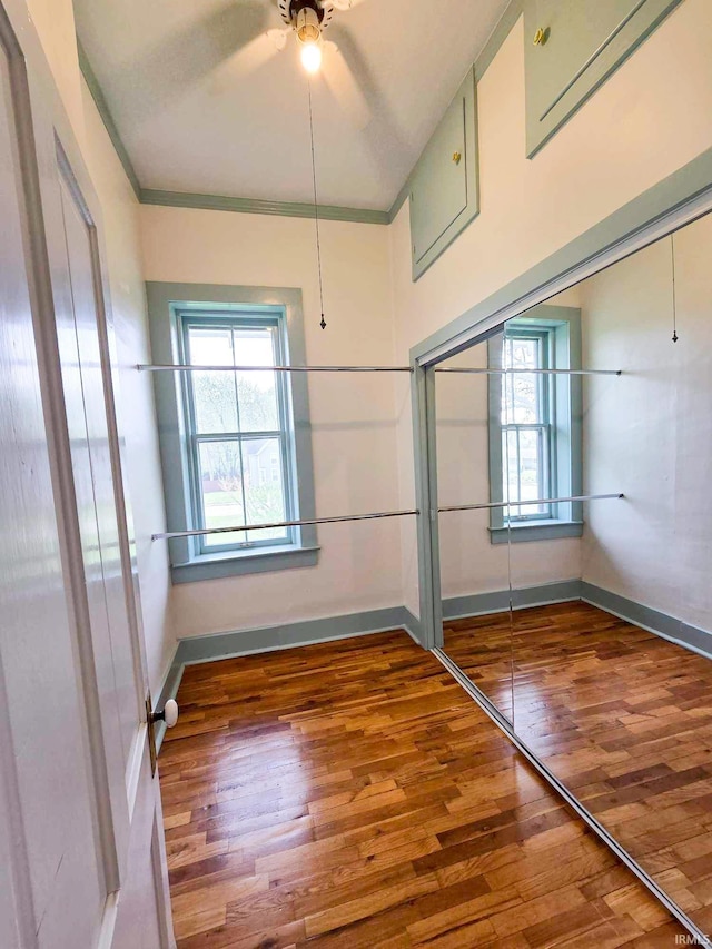 1106 E 5th St, Fowler, IN 47944 - interior space with wood-type flooring, ceiling fan, baseboards, and a wealth of natural light