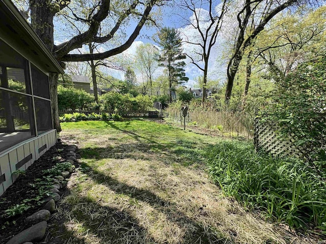 view of yard featuring fence