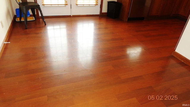4214 Hunters Trce, Evansville, IN 47715 - unfurnished room with baseboards and wood finished floors