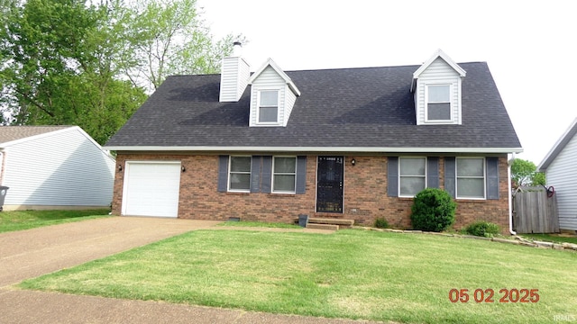 4214 Hunters Trce, Evansville, IN 47715 - cape cod home with a garage, concrete driveway, a front yard, and brick siding