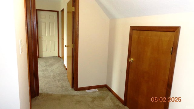 4214 Hunters Trce, Evansville, IN 47715 - hall featuring baseboards, carpet, and vaulted ceiling