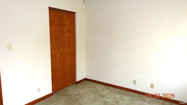 4214 Hunters Trce, Evansville, IN 47715 - unfurnished room with baseboards and light carpet