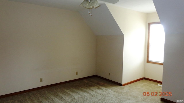 4214 Hunters Trce, Evansville, IN 47715 - additional living space with ceiling fan, vaulted ceiling, baseboards, and carpet