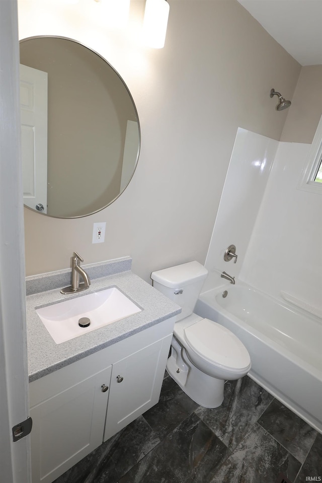1421 E Ireland Rd, South Bend, IN 46614 - bathroom featuring toilet, washtub / shower combination, and vanity