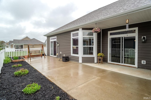 view of patio / terrace with fence