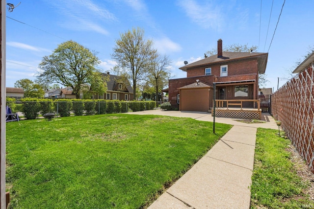 view of yard with a fenced backyard and a patio area