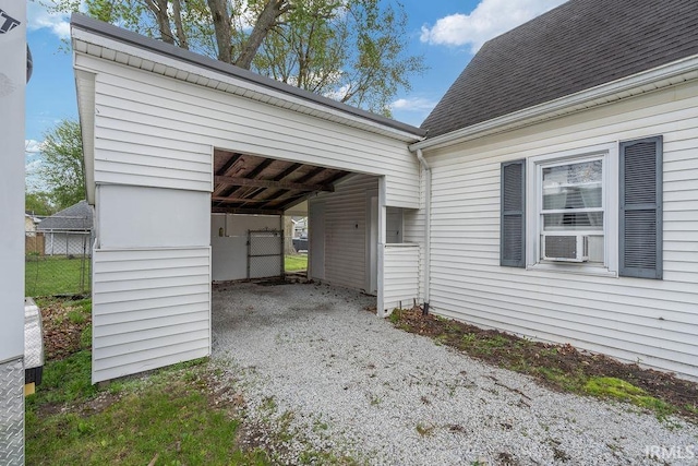 730 S Bell St, Kokomo, IN 46902 - view of property exterior with roof with shingles, cooling unit, and gravel driveway