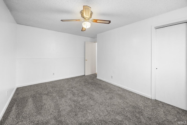 unfurnished bedroom featuring a closet, a ceiling fan, carpet flooring, and a textured ceiling