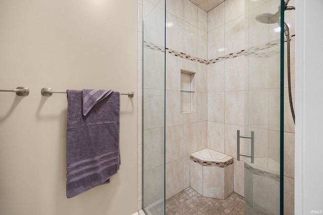 bathroom featuring a stall shower