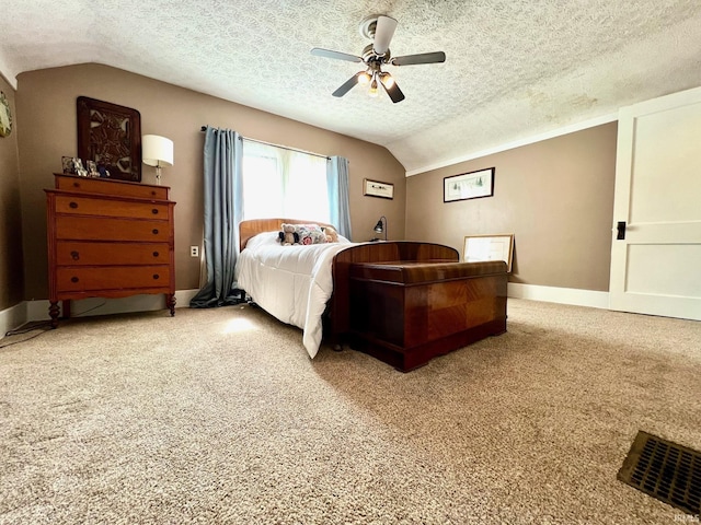 bedroom with light colored carpet, a ceiling fan, a textured ceiling, and lofted ceiling