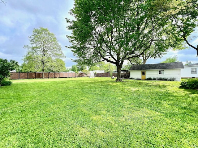 view of yard with fence