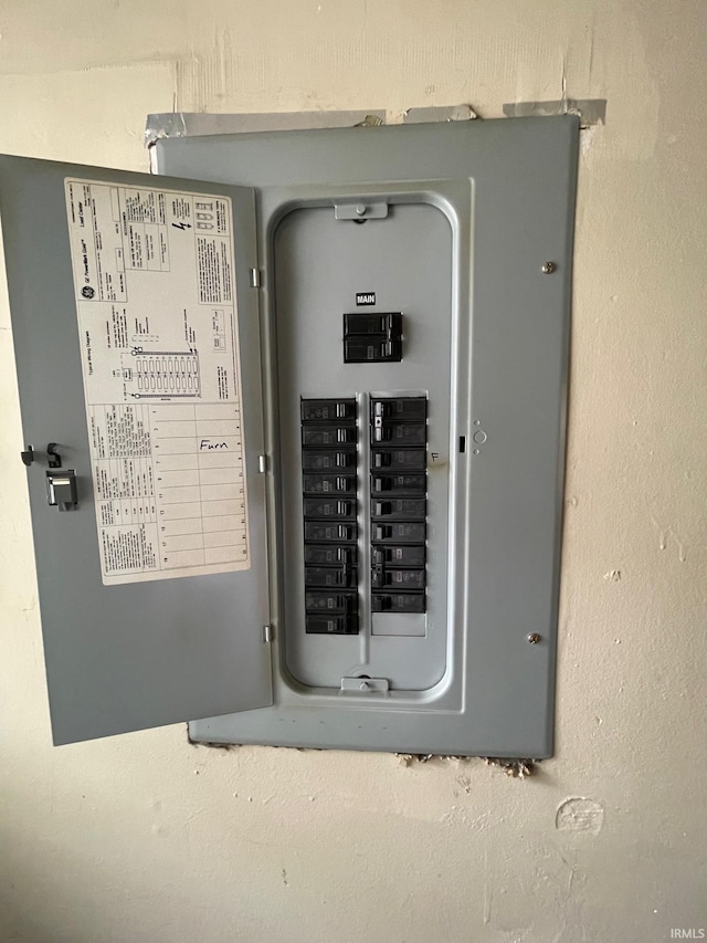 utility room featuring electric panel