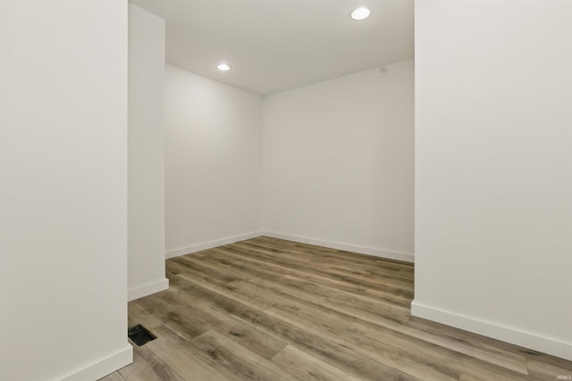 1724 28th St, Bedford, IN 47421 - spare room featuring recessed lighting, wood finished floors, and baseboards