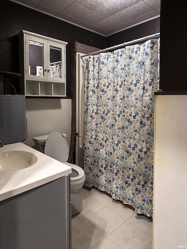 full bathroom featuring vanity, a shower with shower curtain, tile patterned floors, and toilet