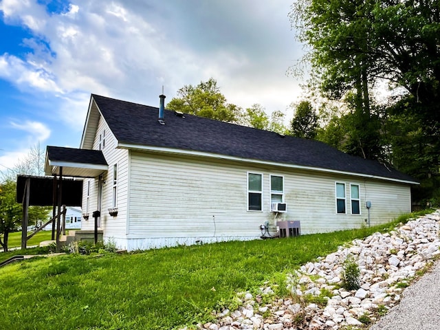 back of house featuring central air condition unit and cooling unit