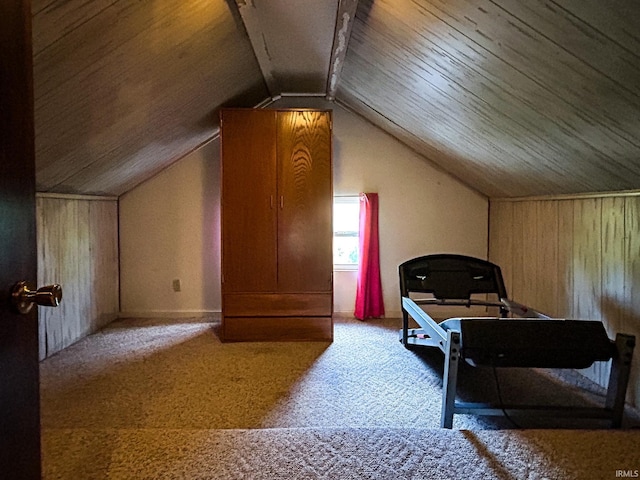 additional living space with carpet floors, vaulted ceiling, and wood ceiling