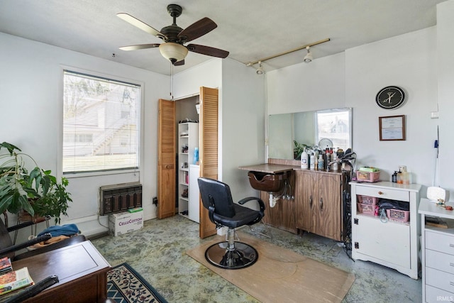 office space featuring ceiling fan