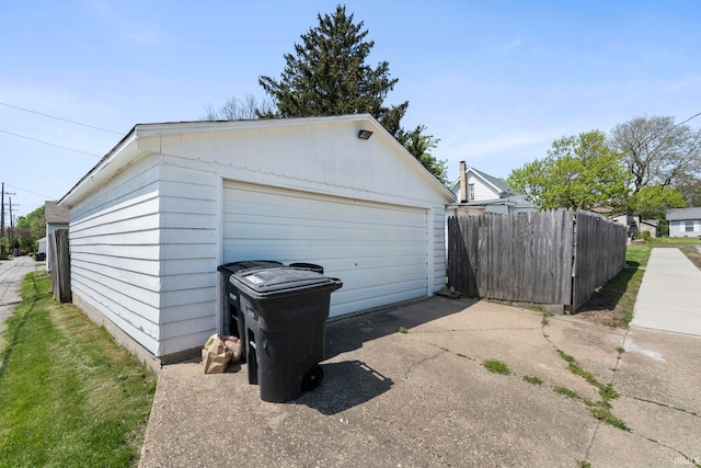detached garage with fence