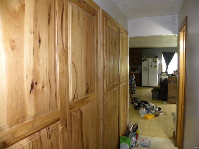 8207 Lehman Rd, Worthington, IN 47471 - corridor featuring a textured ceiling