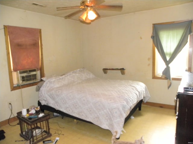 8207 Lehman Rd, Worthington, IN 47471 - bedroom featuring cooling unit, baseboards, and tile patterned floors
