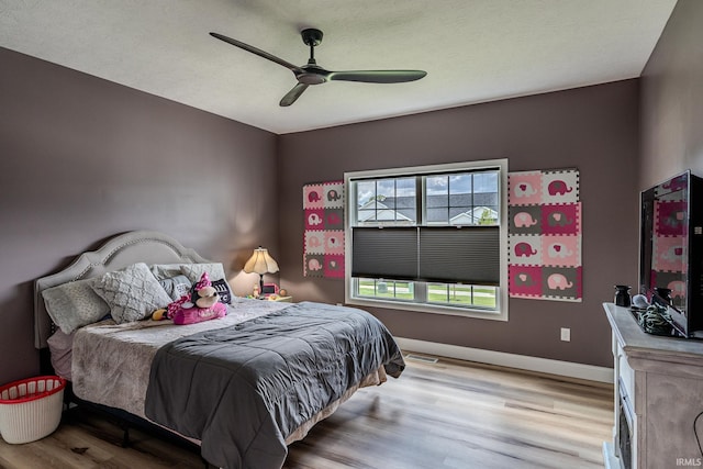 4663 Beringer Dr, Lafayette, IN 47909 - bedroom featuring ceiling fan, baseboards, visible vents, and wood finished floors