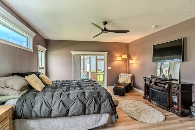 4663 Beringer Dr, Lafayette, IN 47909 - bedroom featuring ceiling fan, access to outside, baseboards, and wood finished floors
