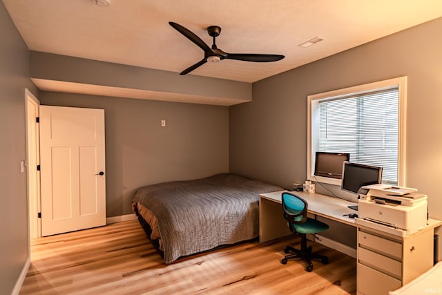 4663 Beringer Dr, Lafayette, IN 47909 - bedroom featuring light wood finished floors, visible vents, baseboards, and a ceiling fan