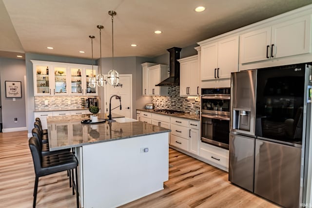 4663 Beringer Dr, Lafayette, IN 47909 - kitchen featuring a sink, recessed lighting, wall chimney exhaust hood, backsplash, and appliances with stainless steel finishes