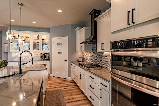4663 Beringer Dr, Lafayette, IN 47909 - kitchen featuring recessed lighting, a sink, white cabinetry, tasteful backsplash, and appliances with stainless steel finishes
